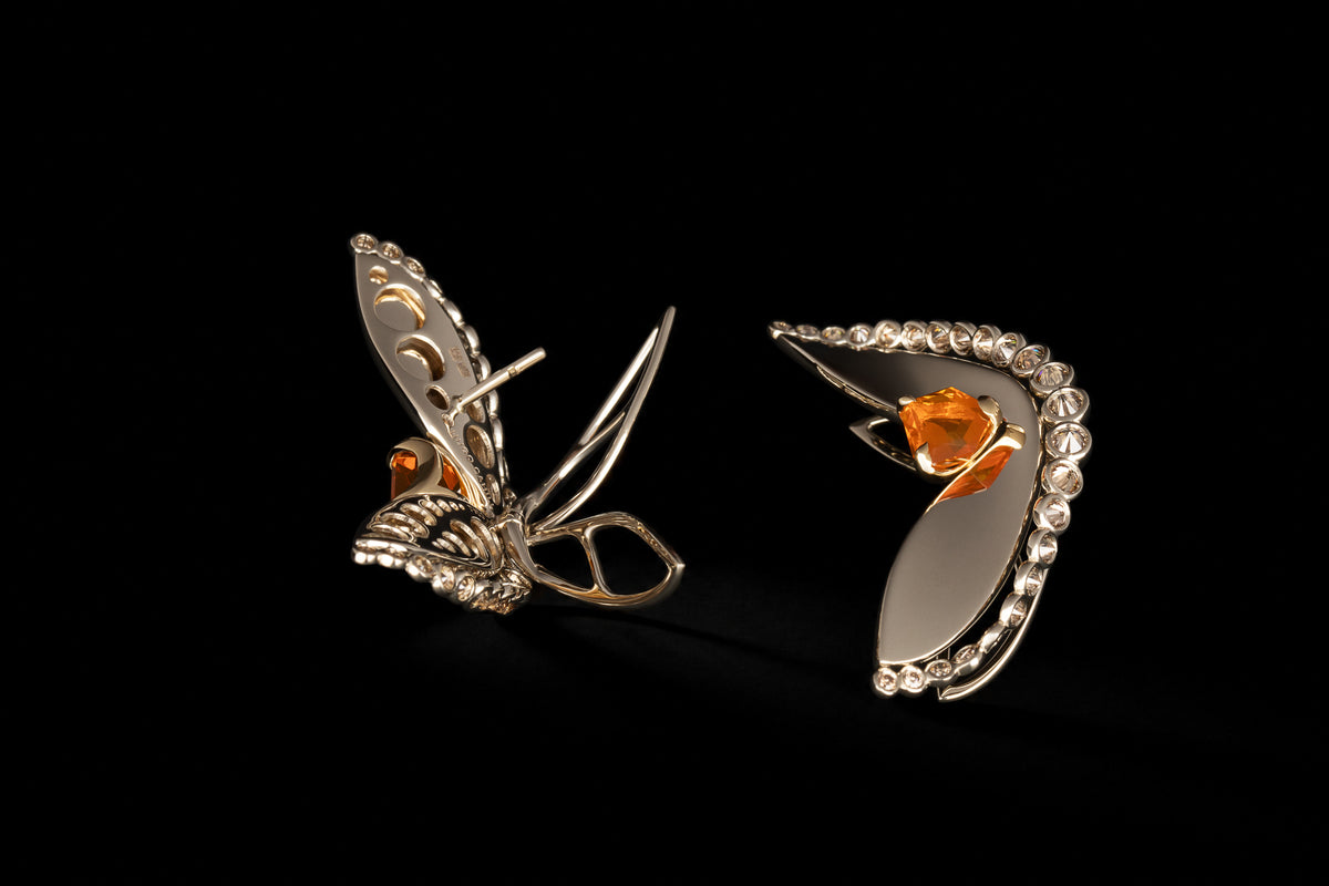 Naiad Glowfall Earrings, macro view of the reverse side showing the gold hallmark stamped into the setting.