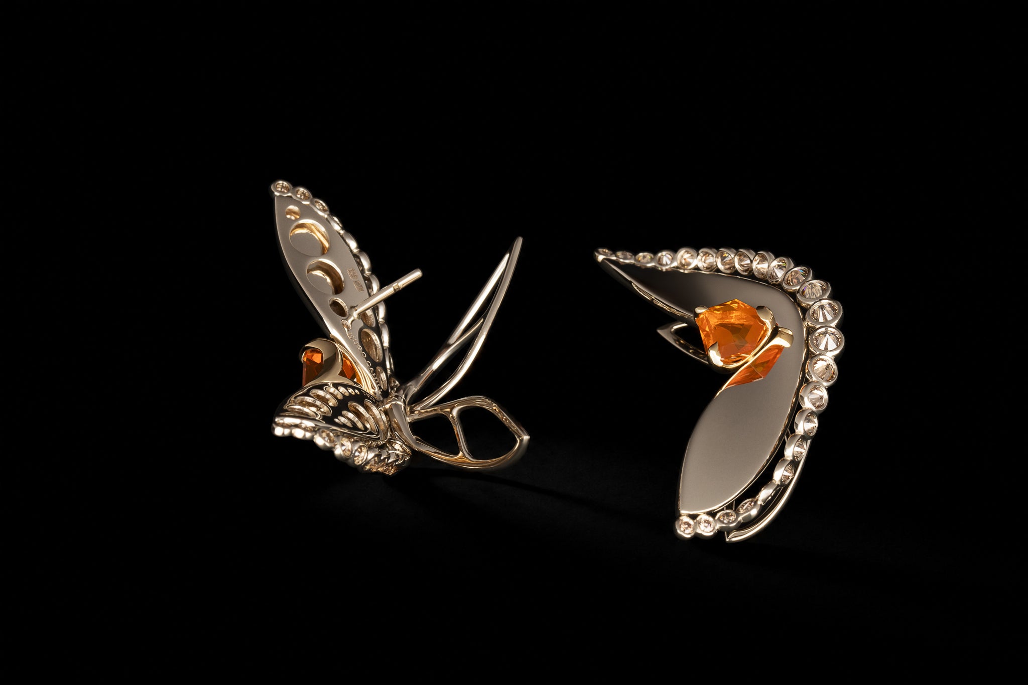 Naiad Glowfall Earrings, macro view of the reverse side showing the gold hallmark stamped into the setting.