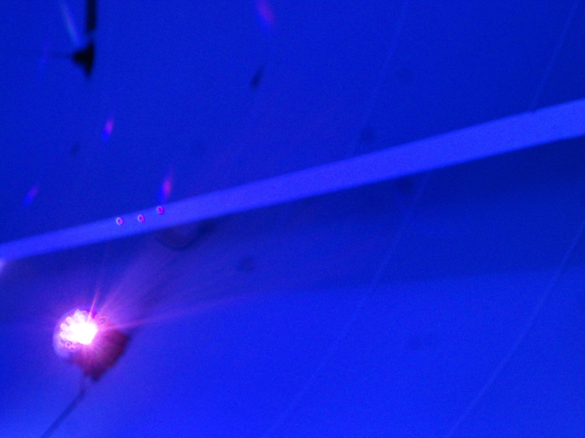 Atmospheric reference image reflecting optical depth and chromatic intensity associated with the amethyst of the Oumuamua Ring

