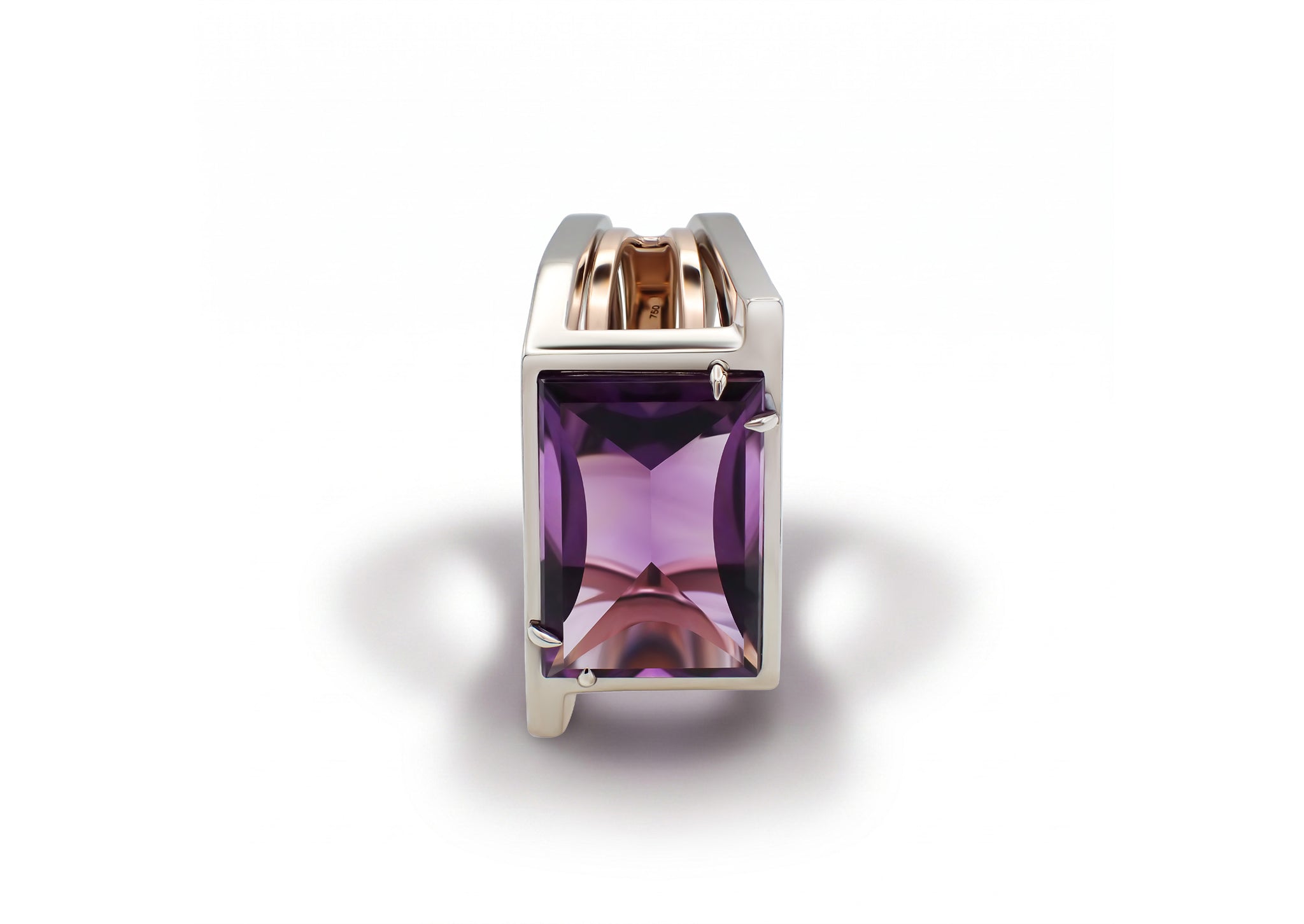 Oumuamua Ring viewed from another angle, highlighting the sculptural gold architecture around the amethyst.