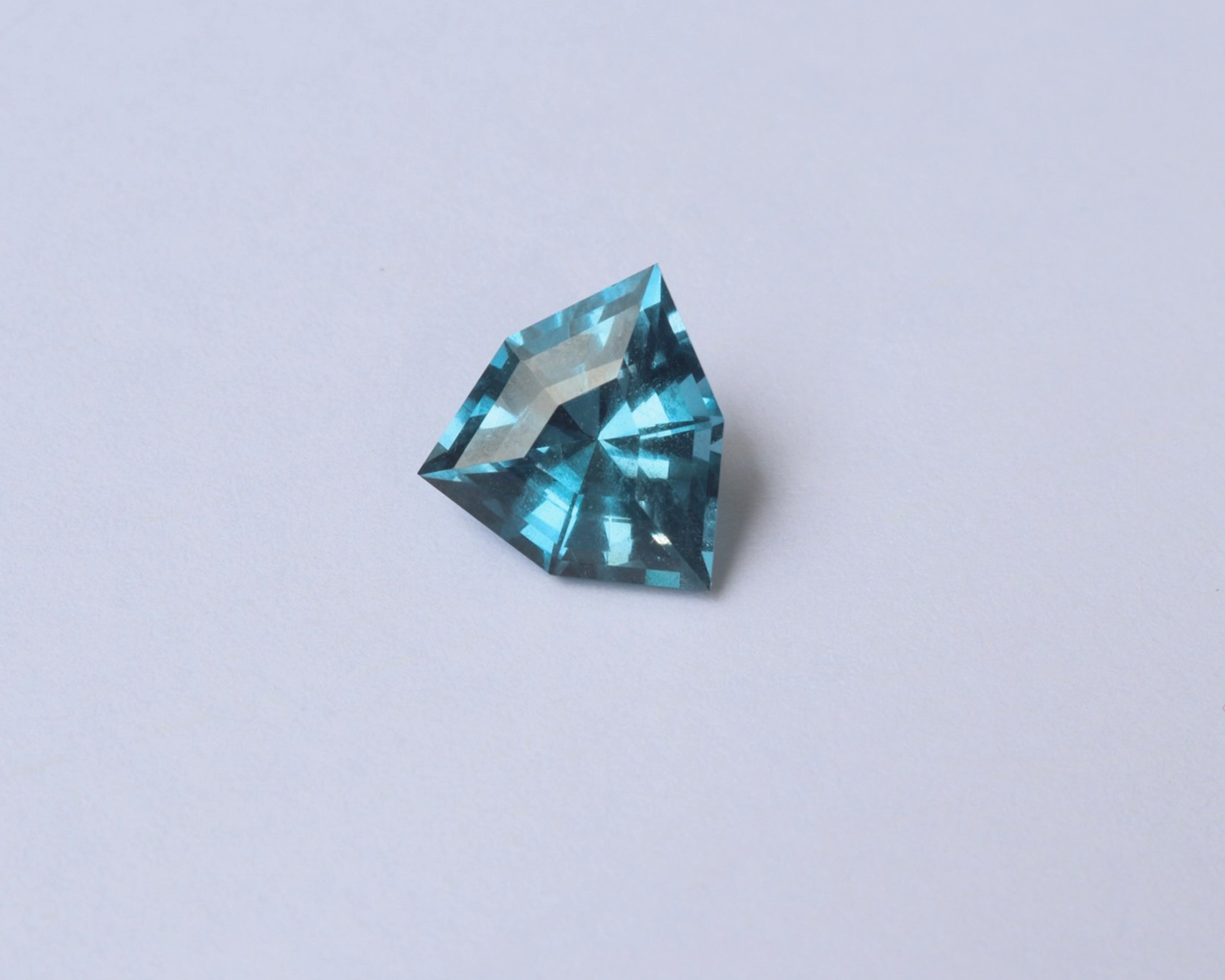 Trillion cut London blue topaz gemstone