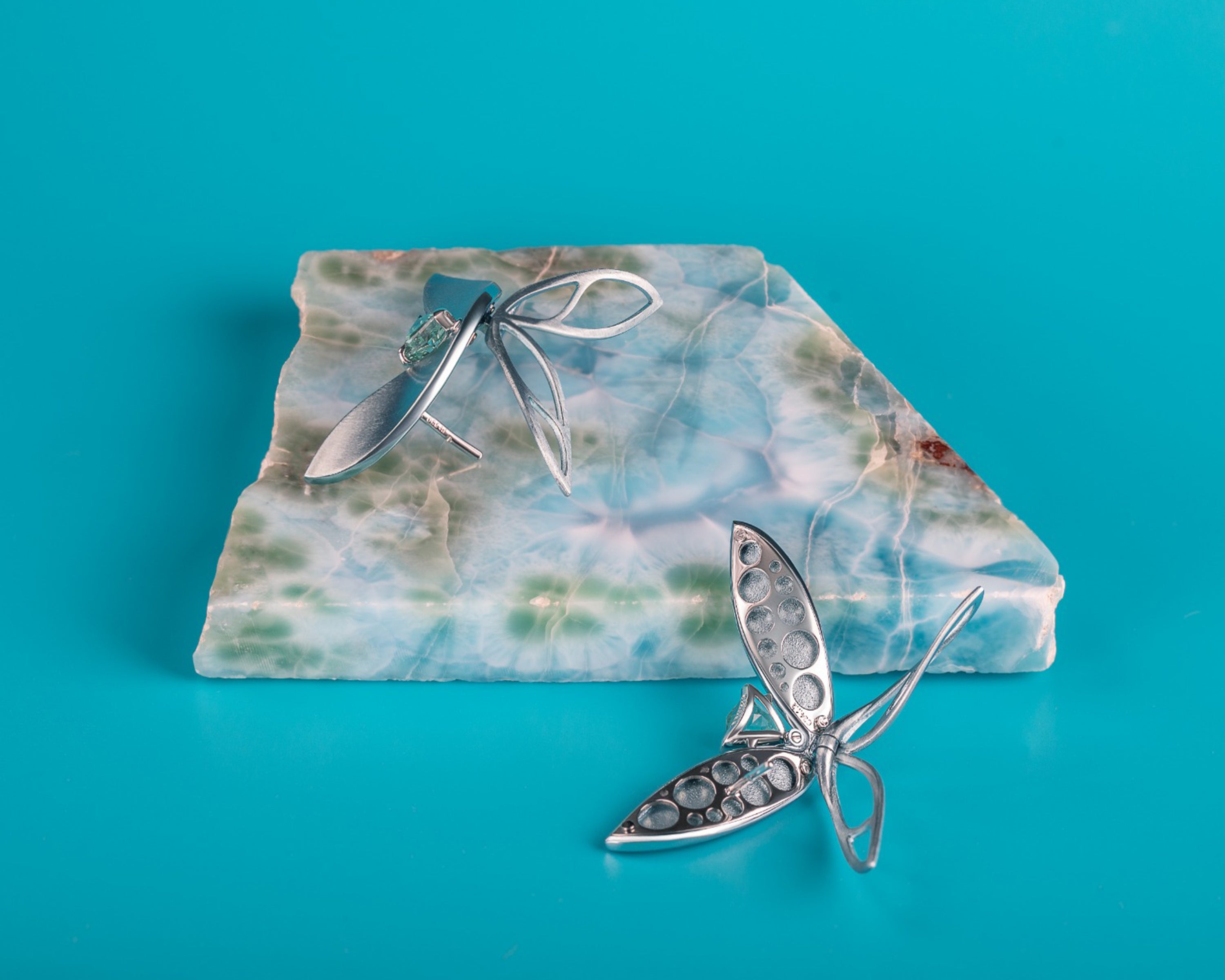 Naiad Skylark earrings informal angle