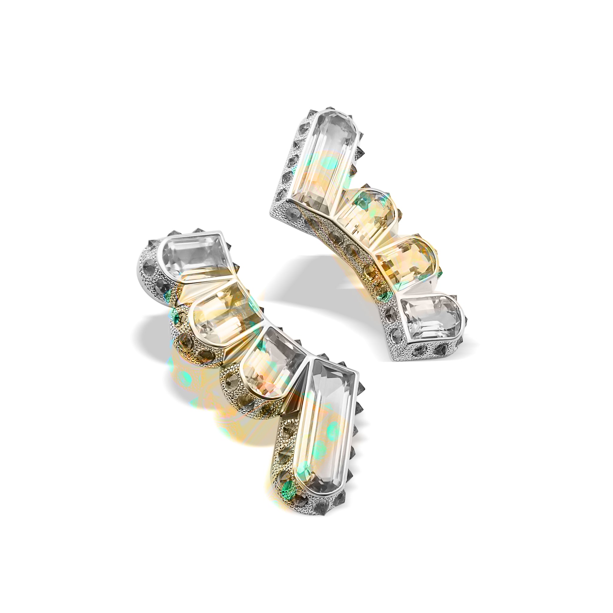 Alternate view of Hyperborea Earrings showing reverse set emeralds and textured gold setting
