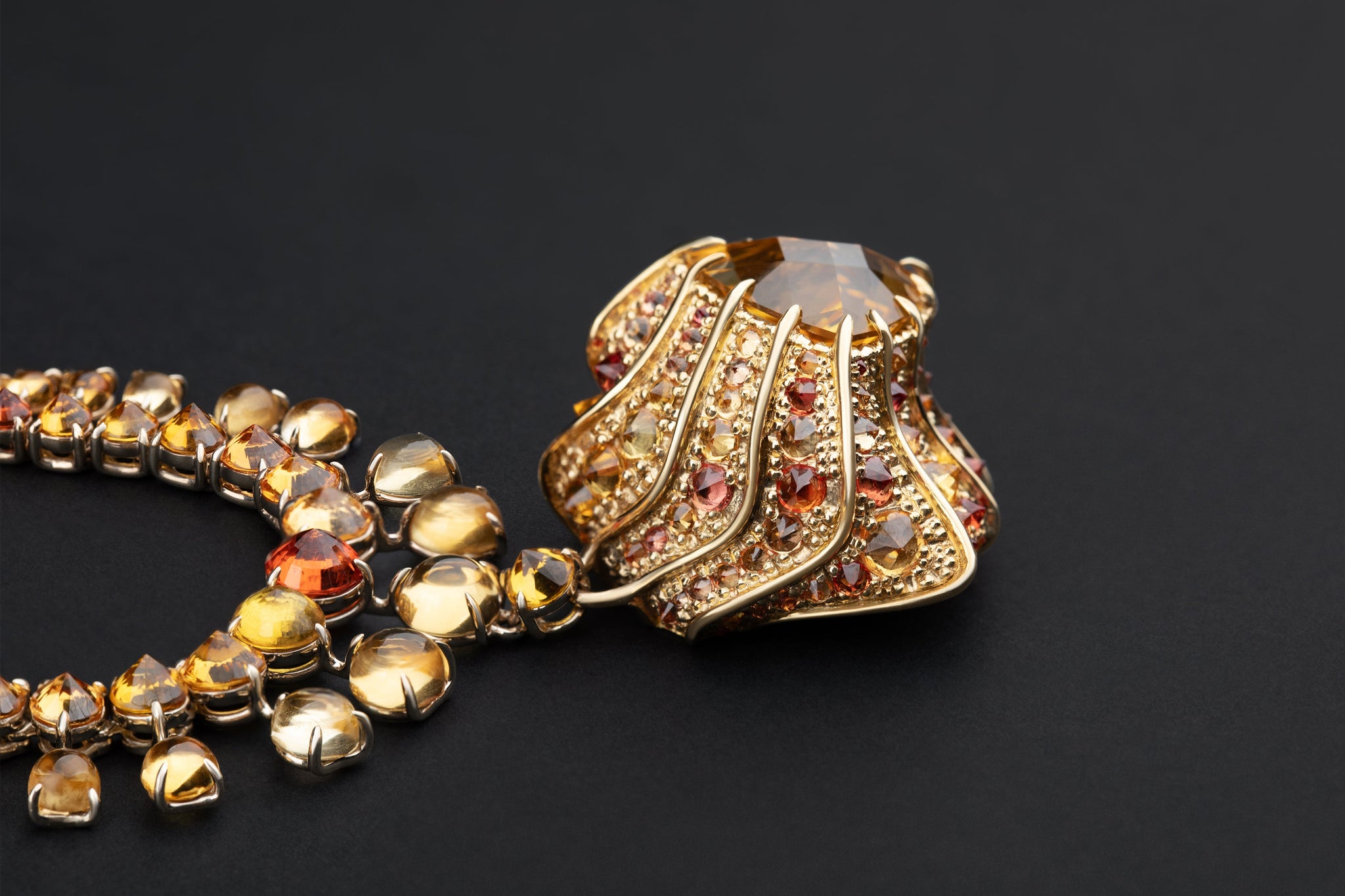Stereón Aurion Necklace by Hugo Cahill, sculptural gold necklace set with citrine and orange sapphires
