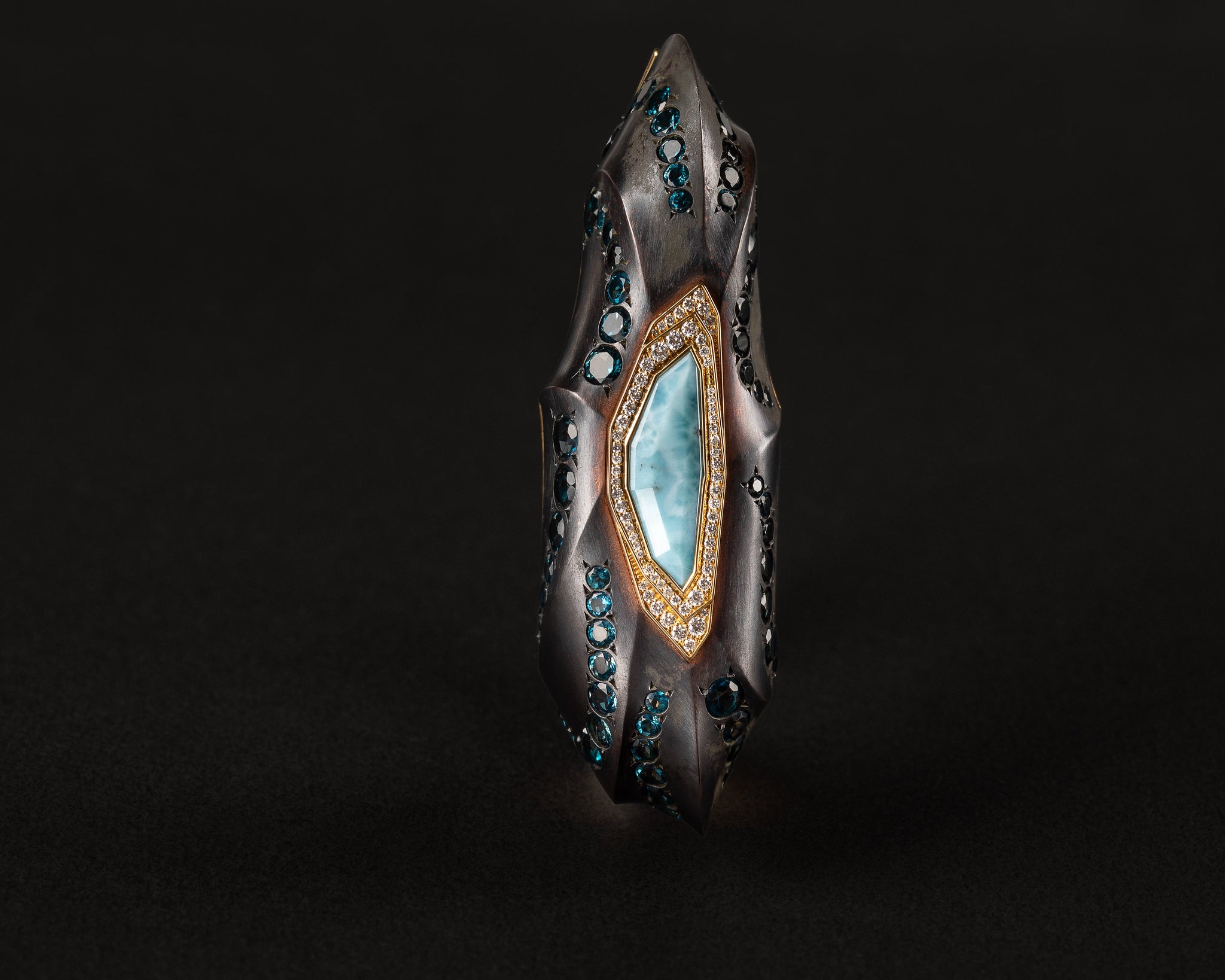 Phokialí Nyktos Cuff by Hugo Cahill, sculptural shakudō bracelet with larimar and London blue topaz
