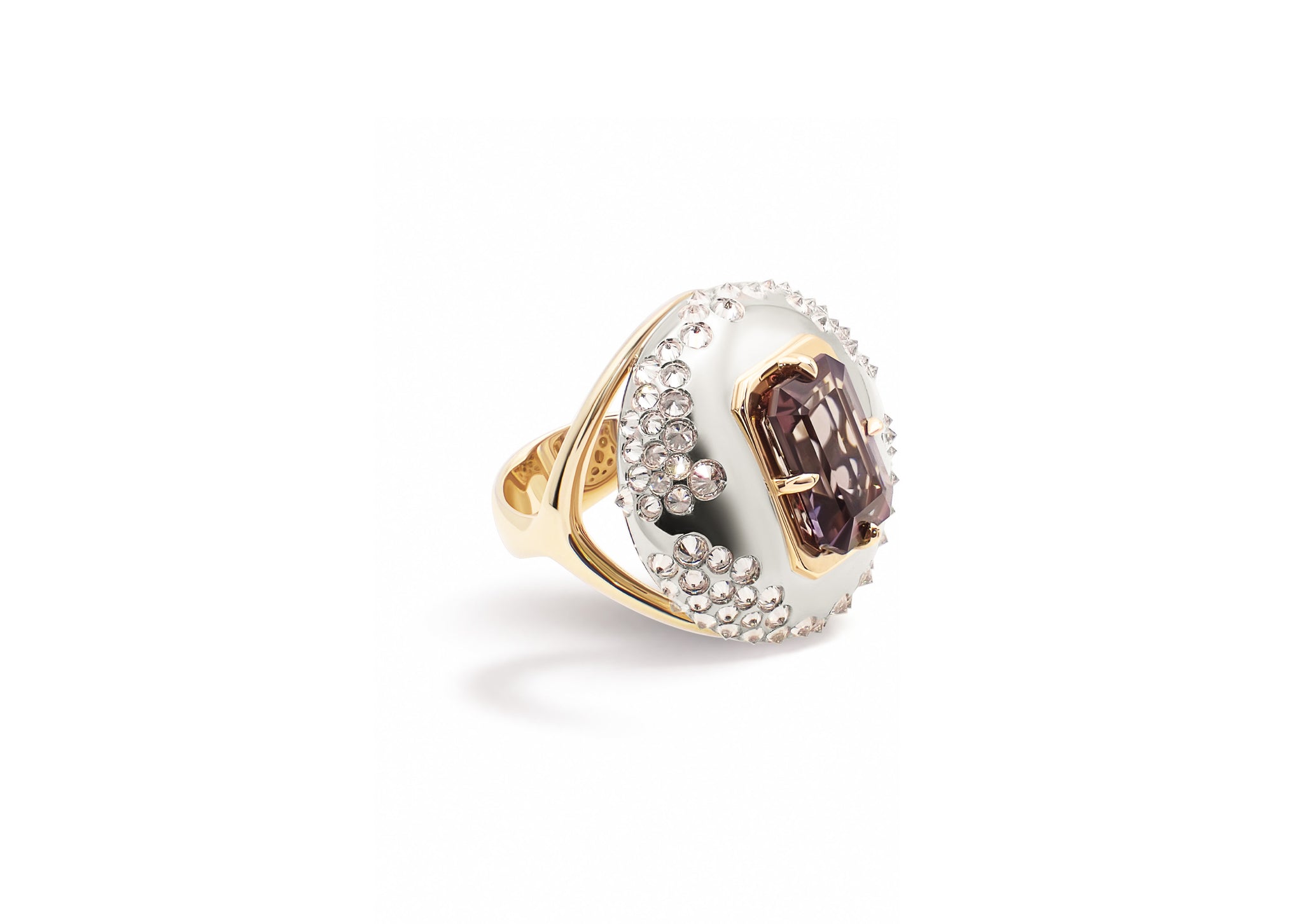 Ophiuchi Tanzanite Ring shown in side view, the arched dome of inverted diamonds framing the tanzanite.