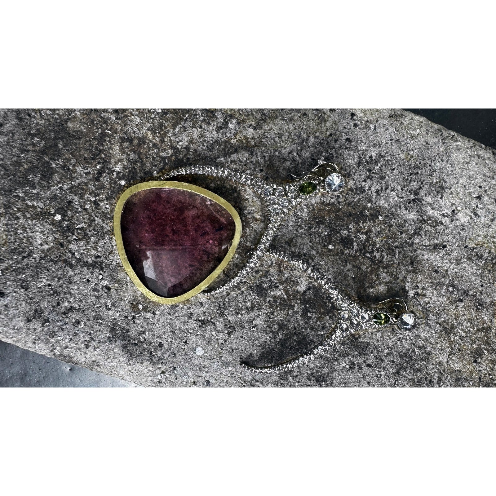 Rose tourmaline gemstone inspiration highlighting natural translucency and plume like internal structure

