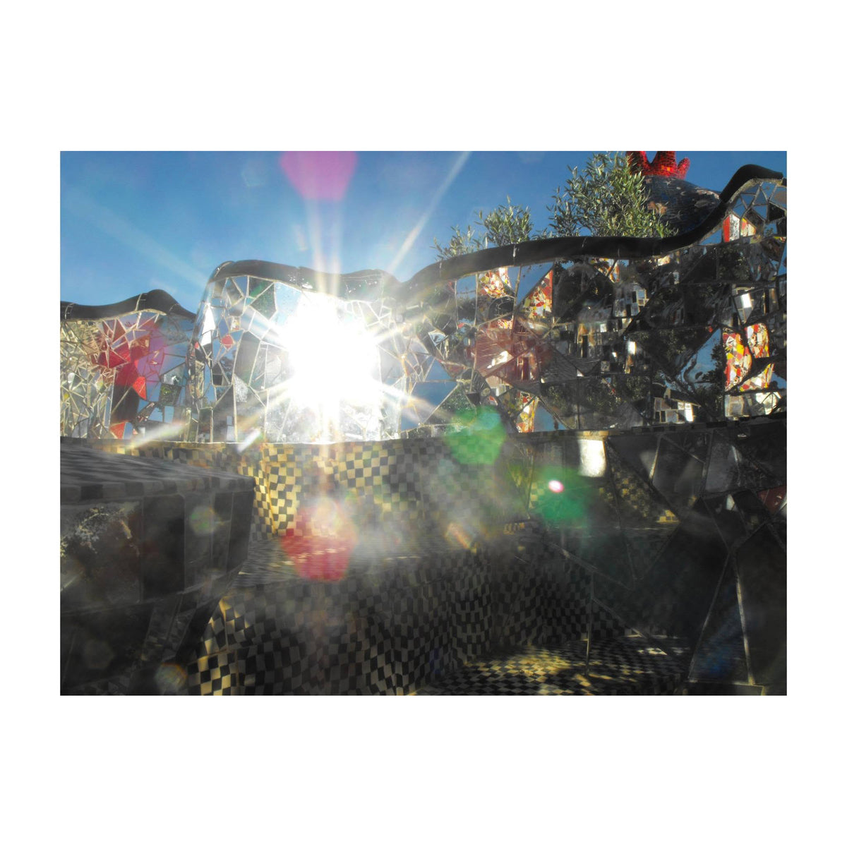 Reference image of the Tarot Garden in Capalbio, Italy, echoing the sculptural forms of the Hyperborea Earrings design.