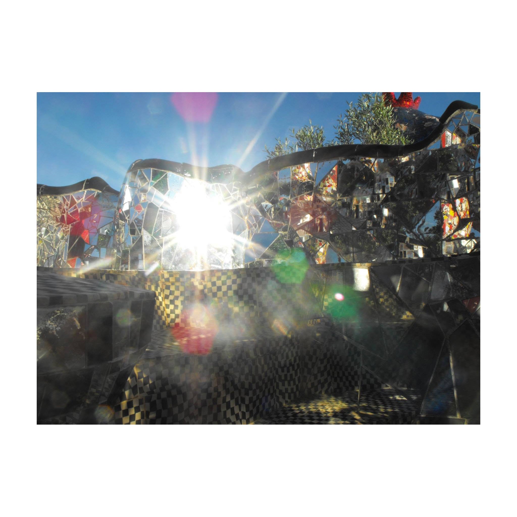 Reference image of the Tarot Garden in Capalbio, Italy, echoing the sculptural forms of the Hyperborea Earrings design.